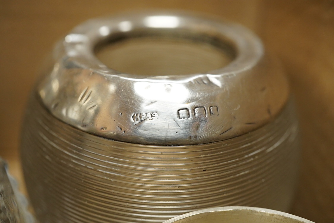 A George V pierced silver three piece condiment set, James Dixon & Sons, Sheffield, 1923/25, together with seven other assorted silver condiments, a silver mounted trinket box, a silver egg cup, a silver mounted glass sa